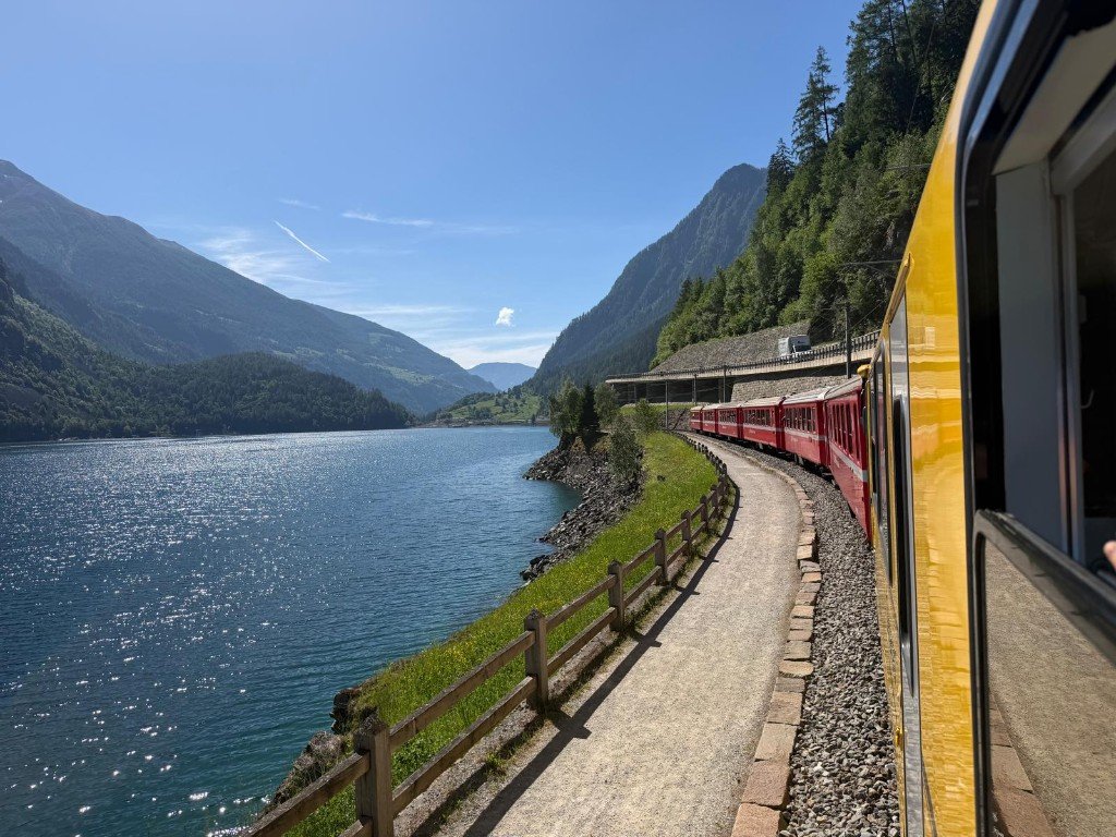 Scenic Swiss train and lake journey